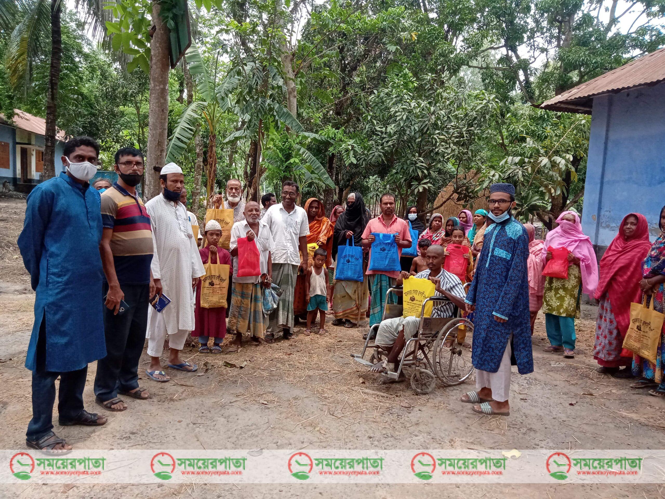 রুপসী নওগাঁর উদ্যোগে ঈদ সামগ্রী বিতরণ