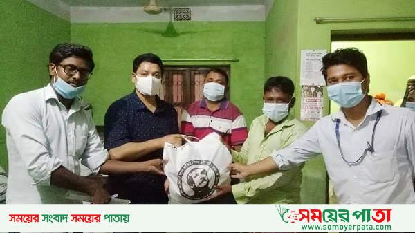 আত্রাইয়ে পল্লী বিদ্যুতের খাদ্য সামগ্রী বিতরণ