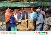 চেয়ারম্যান তোফাজ্জল করিম এর হাত দিয়ে মাননীয় প্রধানমন্ত্রী দেশরত্ন শেখ হাসিনার দেওয়া ১০টাকা মূল্যের চাউল বিতরণ উজানটিয়া।